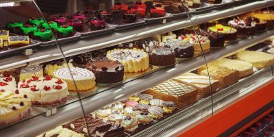 Showcase in culinary district. Cakes, desserts, confectionery Showcase in culinary district. Cakes, desserts, confectionery